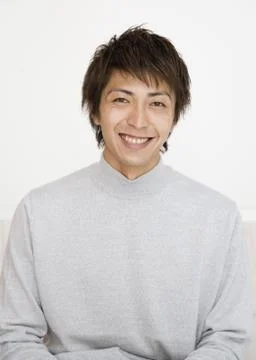 Young man smiling Stock Photos