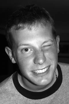 Young man smiling Фото