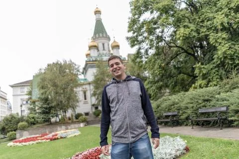 Young man smiling in the streets of Sofia . Stock Photos