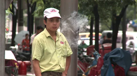 Young man smoking Stock Footage 38176493
