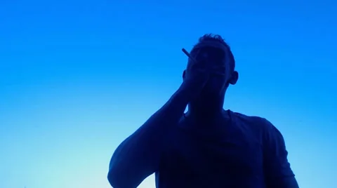Young man smoking Stock Footage 38846109