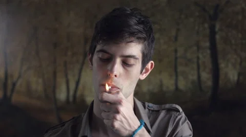 Young man smoking Stock-Footage 47827689