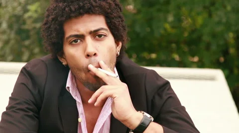 Young man smoking Stock Footage 52009462