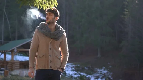 Young man smoking Stock Footage 86647188