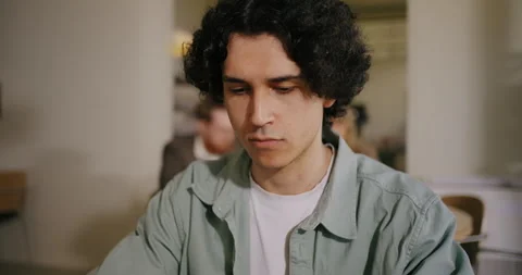 Young Man Is Software Developer Or Web Designer Working Out Of Office, Sitting Stock Footage 276846142