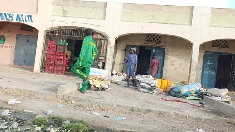 Young Man Sorting Used Sacks For Reuse Sale Kano Nigeria Vídeo Stock 330599946