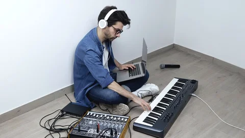 Young man in sound recording studio. Sid... | Stock Video | Pond5
