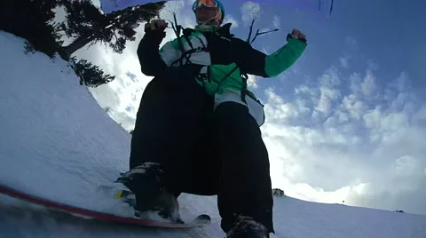 A young man speed flying over mountains , slow motion. Stock Footage 68534248