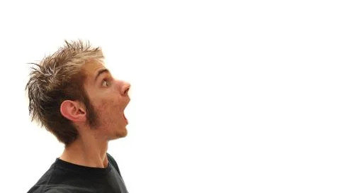 Young man spewing out blank empty copy space Stock Photos