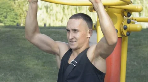 Young man sporting appearance is engaged on a simulator Stock Footage 67564838