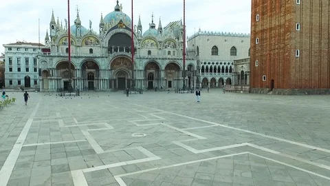 Young Man On The Square Of The Holy Mark (Piazza San Marco) And St. Mark's Stock Footage 108055713