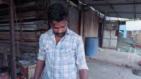 Young man standing and talking communication with workshop owner at fabrica.. Stock Footage 267848310