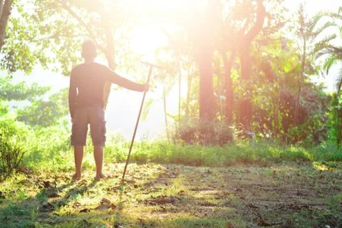 Young man standing to looking at the future, success concept. Stock Photos