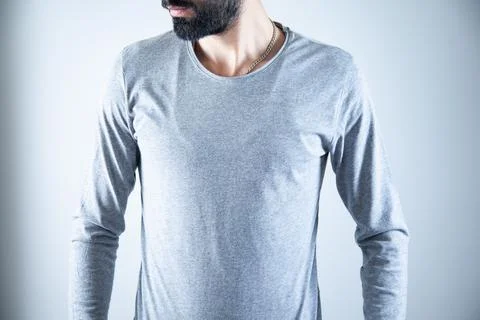 The young man standing in studio Stock Photos
