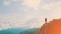 The young man stands on the mountain cliff 4k or 4k+ Resolution