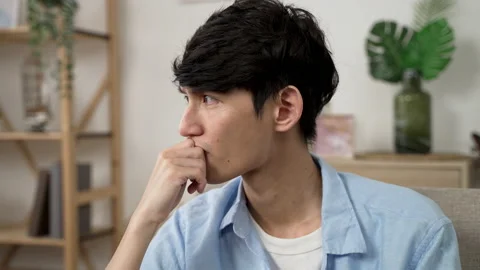 Young man staring away at empty area Stock Footage 160347301