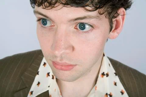 A young man staring Stock Photos