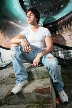 Young man on steps Stock Photos