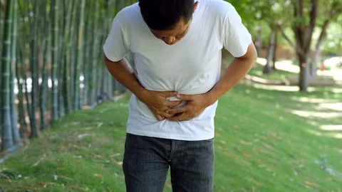 A young man with a stomachache Stock Footage 132806653