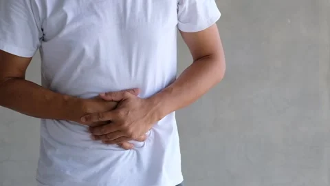 A young man with a stomachache Stock-Footage 132973206