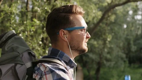 Young Man Stops Drinking Water During Hiking Stock Footage 77677560