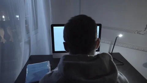 Young man struggling with script writing on computer at night in room Stock Footage 85706581