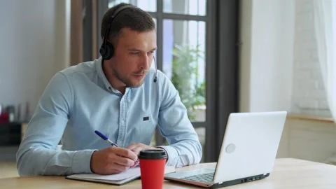 Young man student study at home using laptop and learning online. Stock Footage 136080830