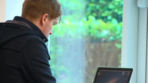 Young man in Study area/canteen Stock Footage 25859514