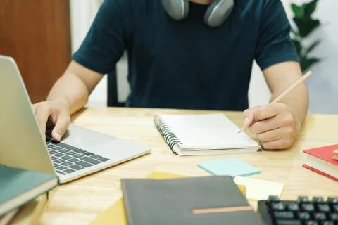 Young man study in front of the laptop computer at home Stock-Illustration