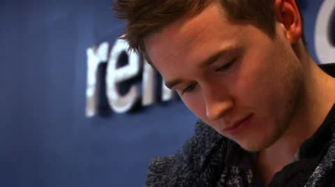 Young man studying at a university/college/learning facility Stock Footage 25859386