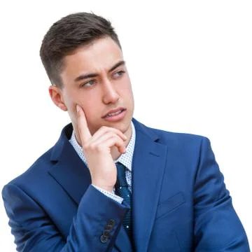 Young man in suit looking aside. Stock Photos