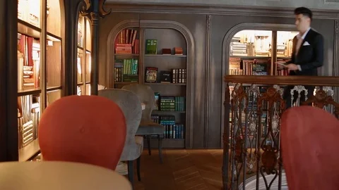 Young man in suit using smartphone Stock Footage 72376964