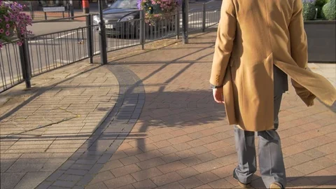 Young man in suit walking through London in Slow motion  Stock Footage 85667908
