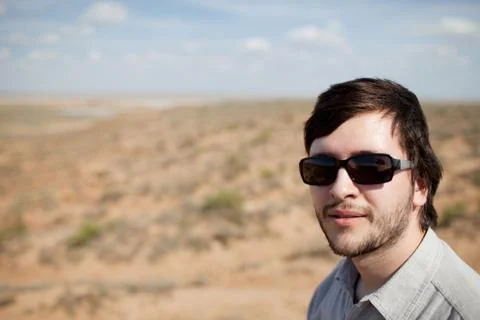 Young man in sunglasses Stock Photos