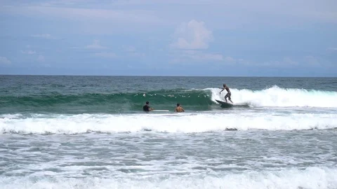 Young Man Surfing On High Wave In Ocean [Slow Motion] Stock Footage 88965327