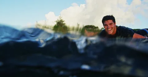 Young Man Surfing Longboard Stock Footage 67770800