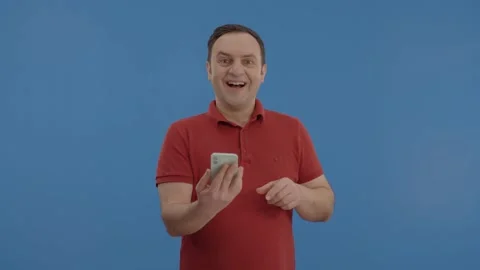 The young man is surprised at the video Видео 148260276