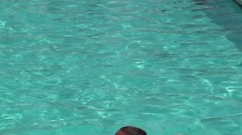 Young Man Swimming In Pool Stock Footage 30460582