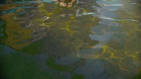 Young man swimming in the pool Stock Footage 136362937