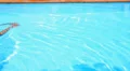 Young Man Swimming in a Pool in Summer Villa. Slow Motion. HD Footage
