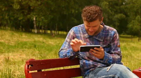 Young man with tablet computer Stockbeeldmateriaal 24759515