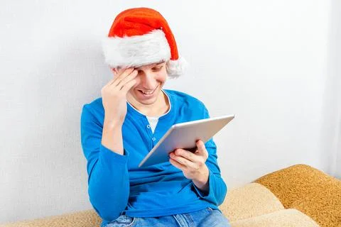 Young Man with a Tablet Computer Stock Photos