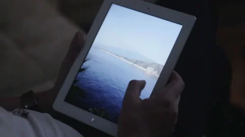Young Man With Tablet Computer Sitting Hd Video stock 46777988