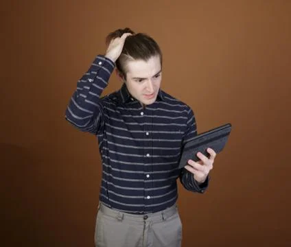 Young man with tablet Stock Photos
