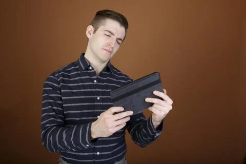 Young man with tablet Stock Photos