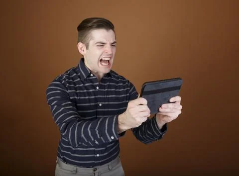 Young man with tablet Stock Photos