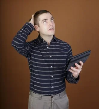 Young man with tablet Stock Photos
