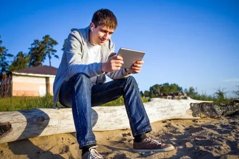 Young Man with a Tablet Stock Photos