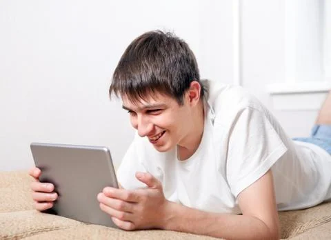 Young Man with a Tablet Stock Photos
