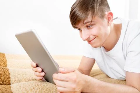 Young Man with a Tablet Stock-Fotos